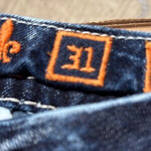 Miss Me Navy Skinny Jeans with Vibrant Orange Stitching